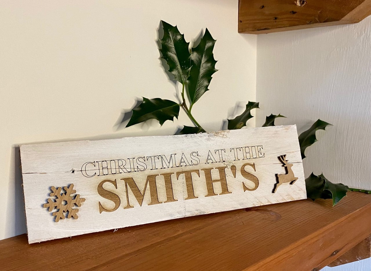 Rustic 'Christmas at the...' sign