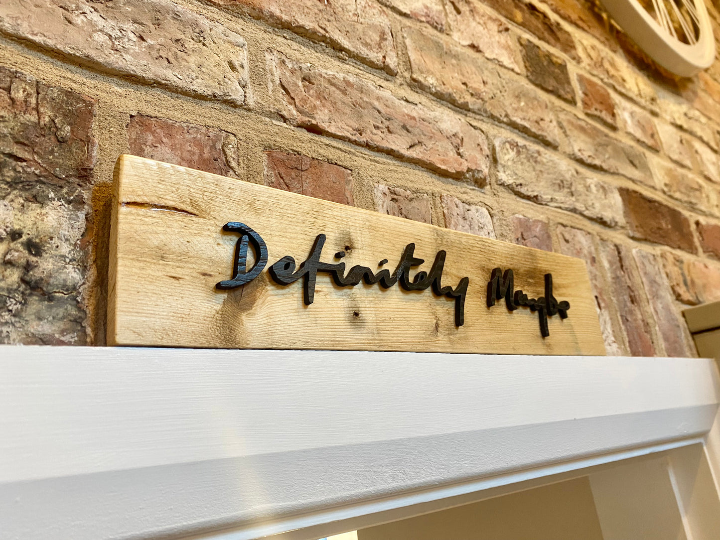 Rustic 'Definitely Maybe' sign