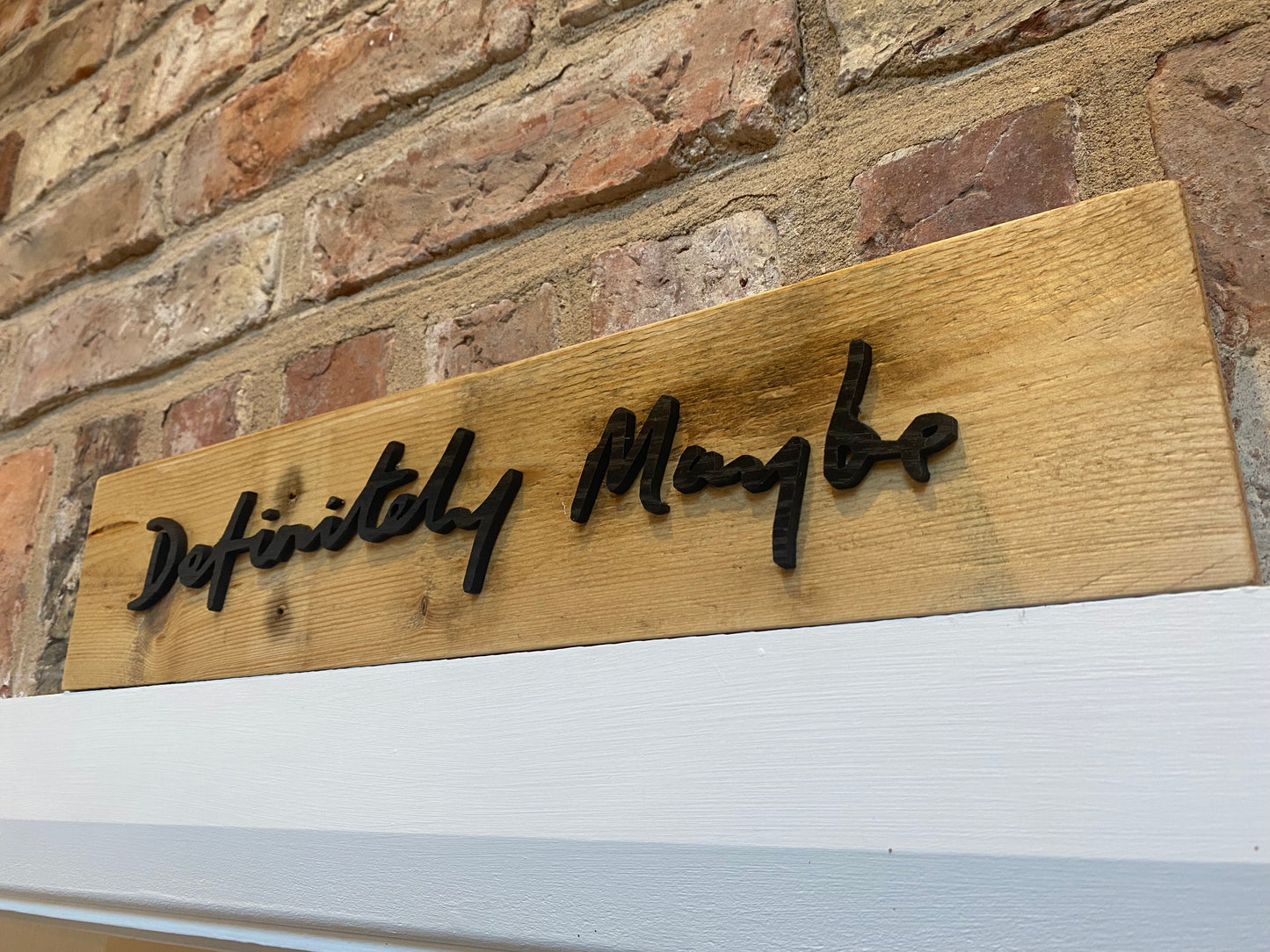 Rustic 'Definitely Maybe' sign