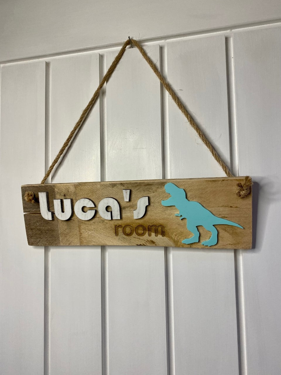 Child's dinosaur bedroom door sign