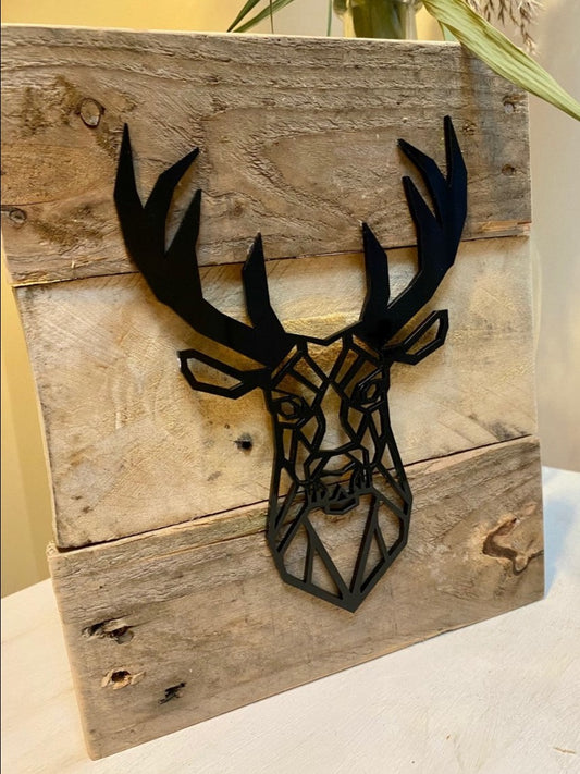 Oiled, reclaimed pallet wood with a geometric laser cut stags head from a range of colours/materials