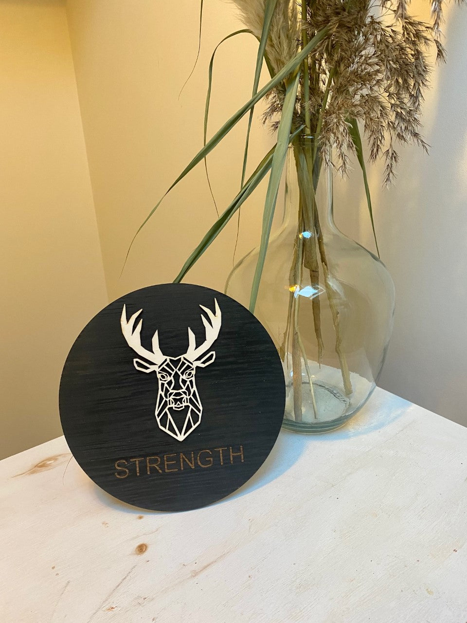 Geometric stag 'strength' disc