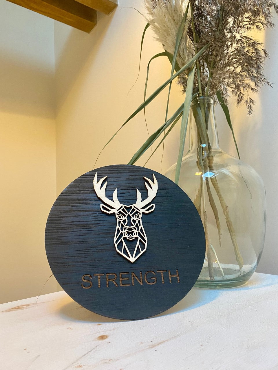 Geometric stag 'strength' disc