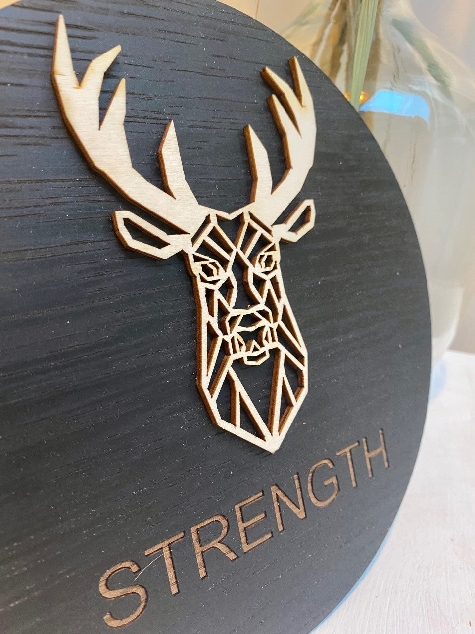 Geometric stag 'strength' disc