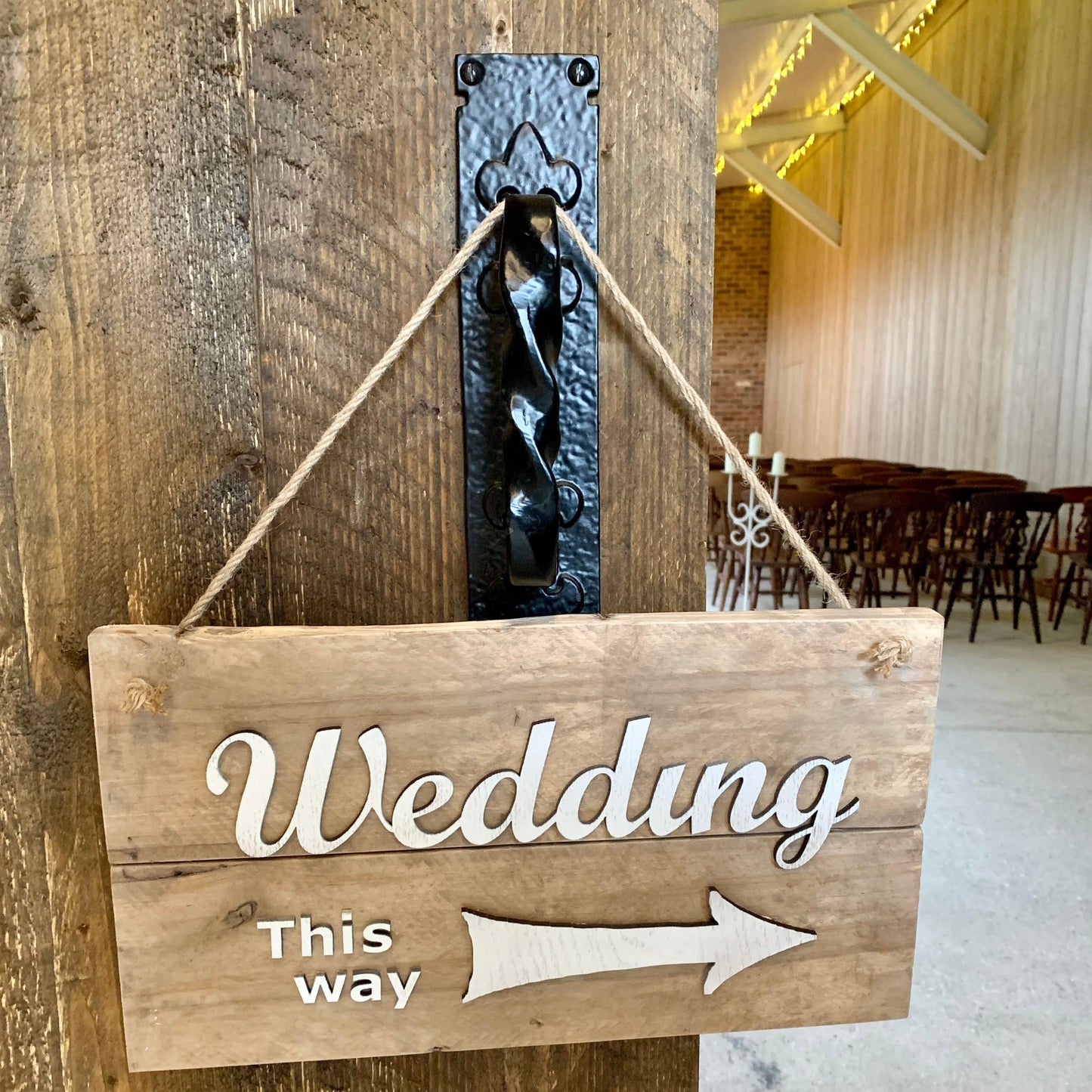 'Wedding this way' sign