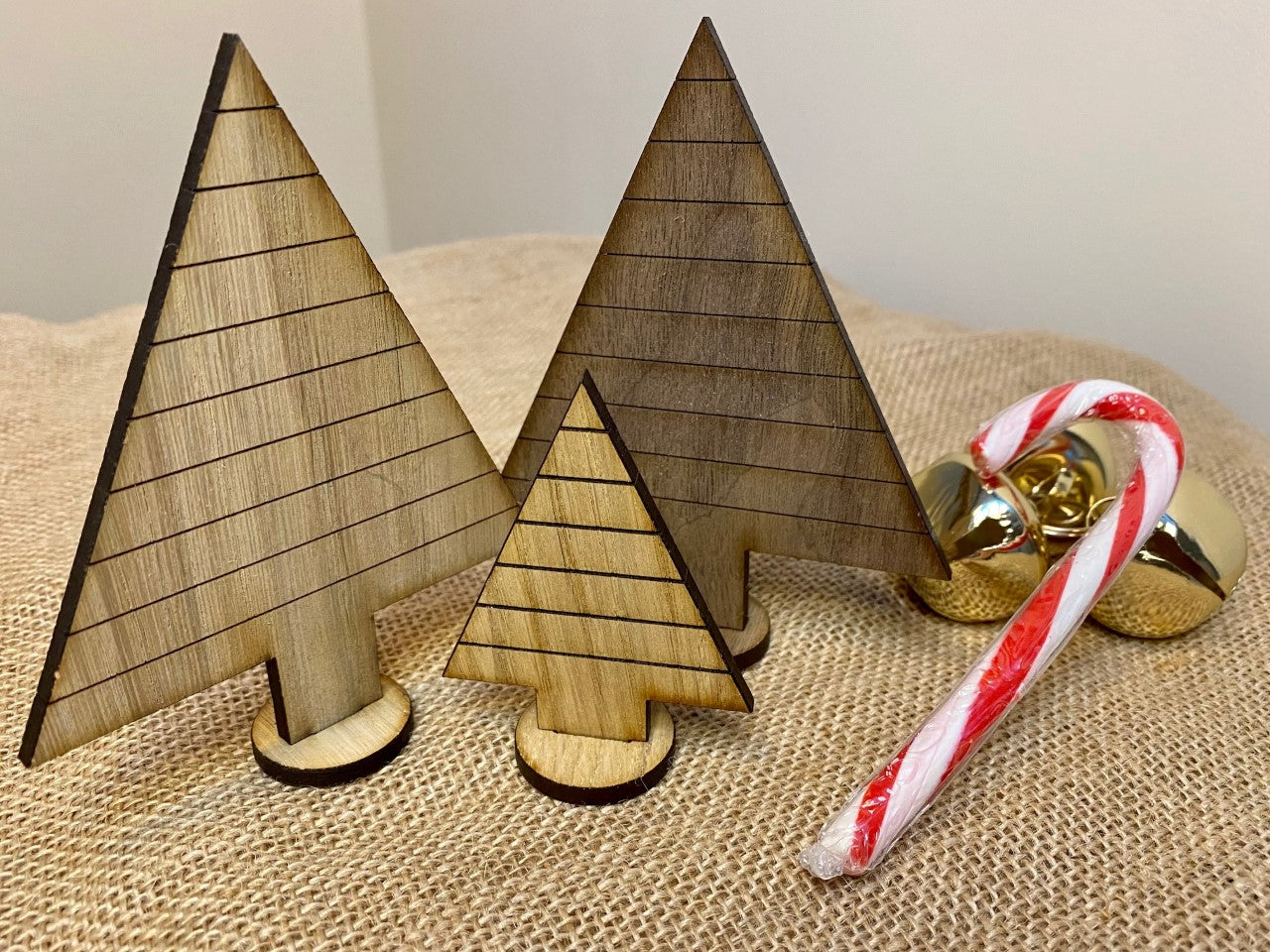 Collection of three engraved Christmas trees